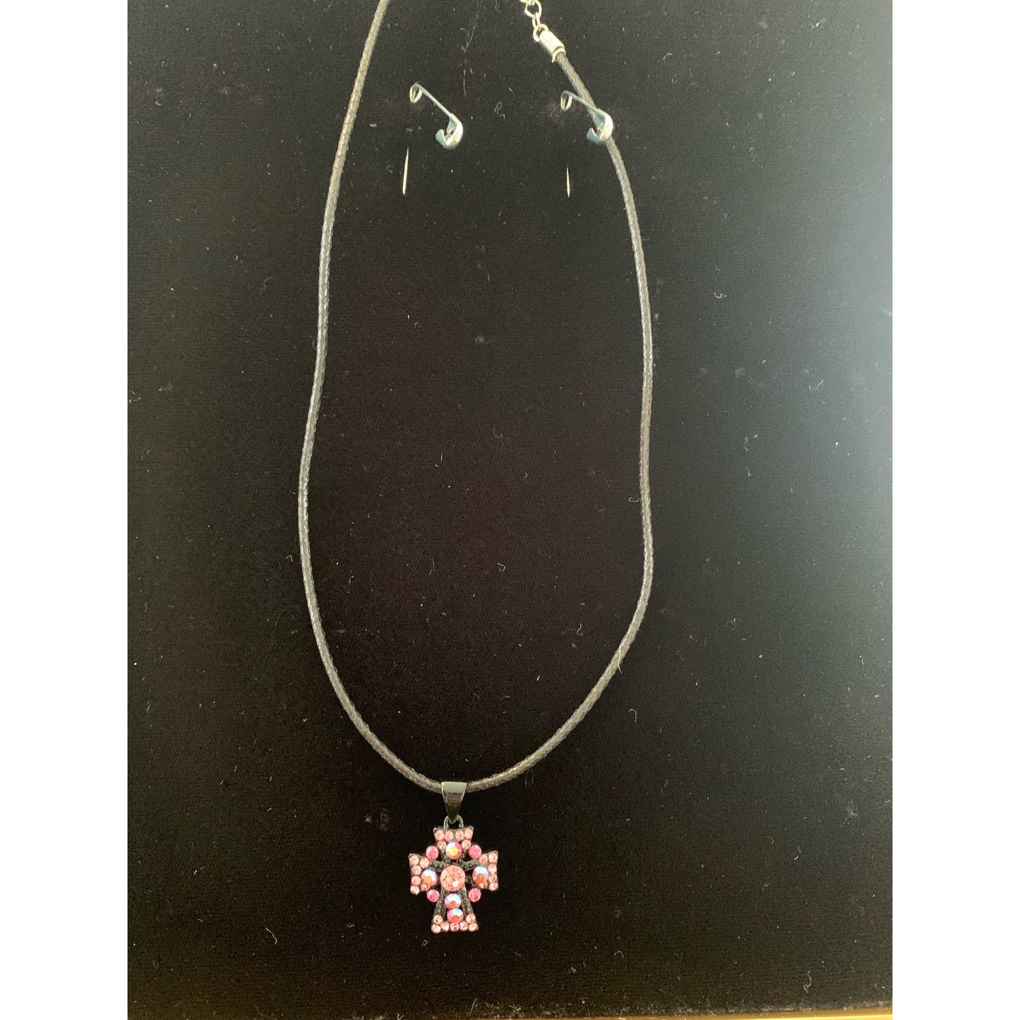 Pink Rhinestone cross on black cord necklace