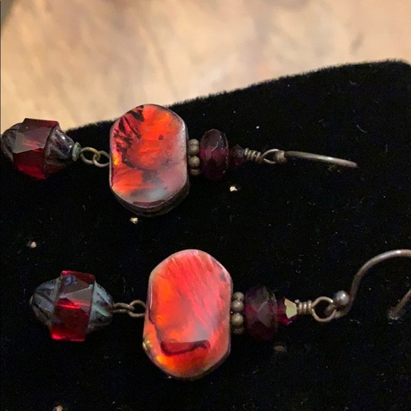 Red swirl chandelier stone earrings