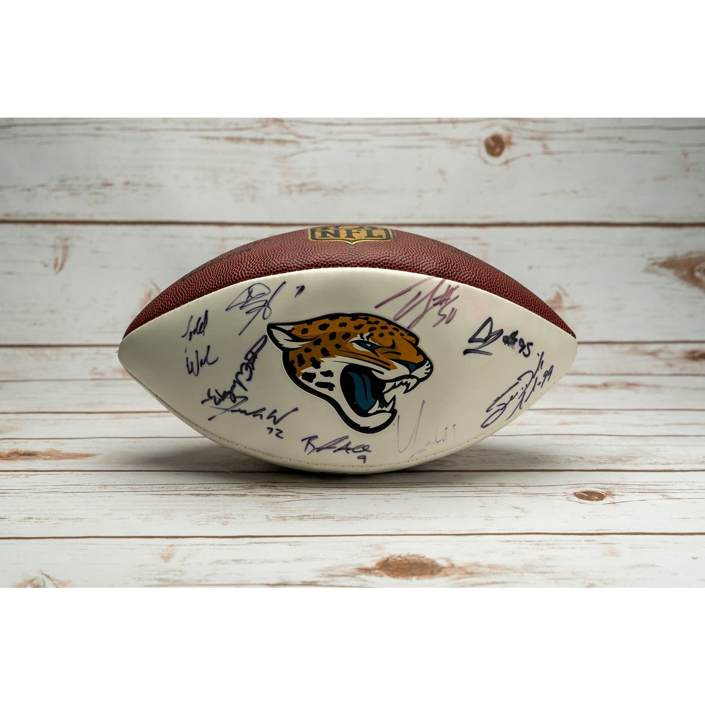 Authenticated Jacksonville Jaguars official football signed by 25 players from 2015-2017