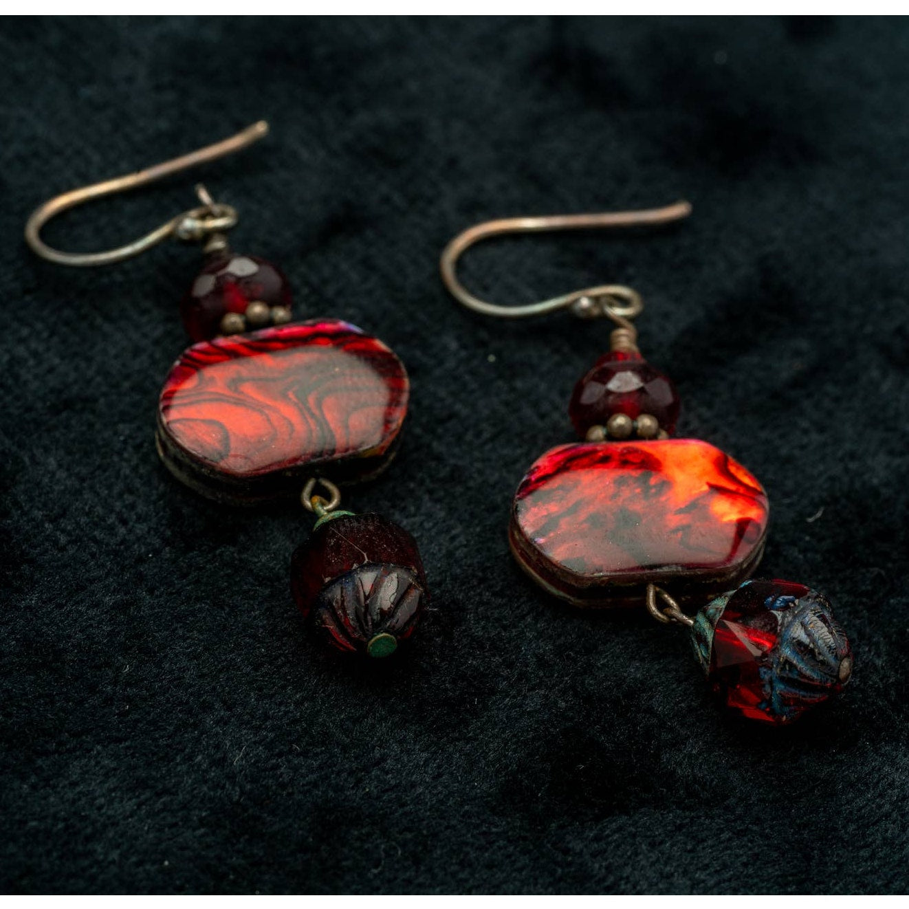 Red swirl chandelier stone earrings