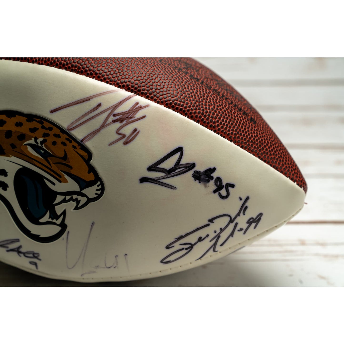 Authenticated Jacksonville Jaguars official football signed by 25 players from 2015-2017